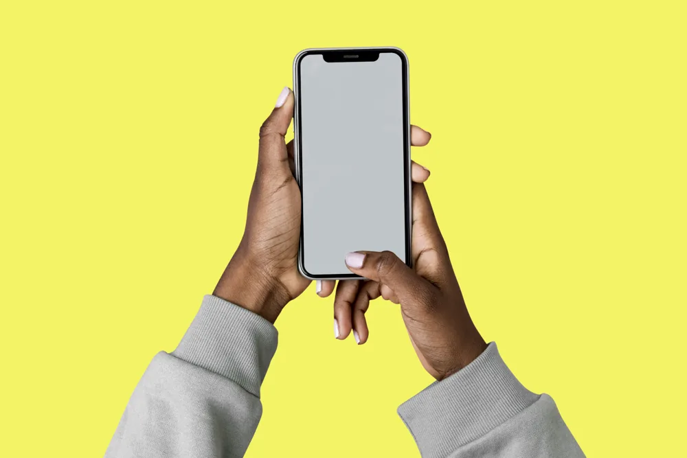 Hands holding a smartphone